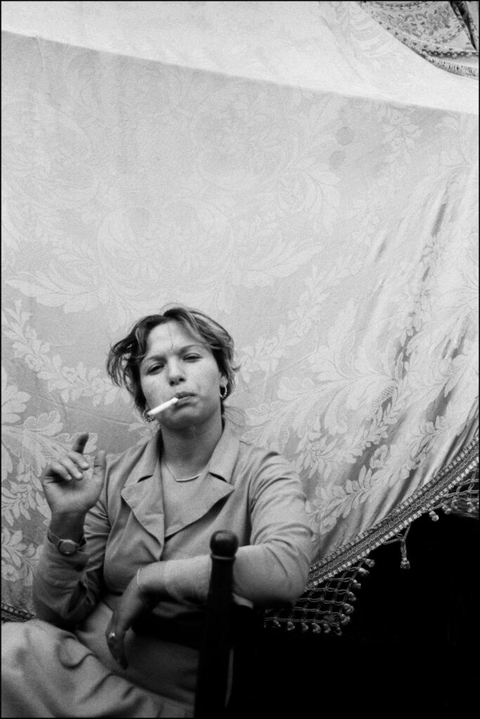 Letizia Battaglia: Letizia Battaglia, Woman smoking, Catania, 1984, Letizia Battaglia Archive.
