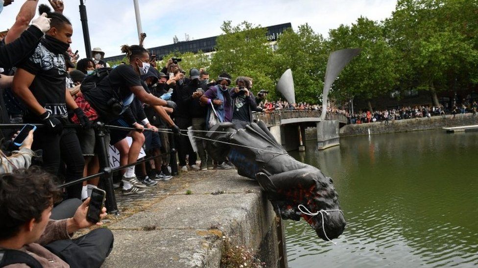 London statues: Edward Colston statue toppled by protestors in Bristol harbour, 2020. BBC.
