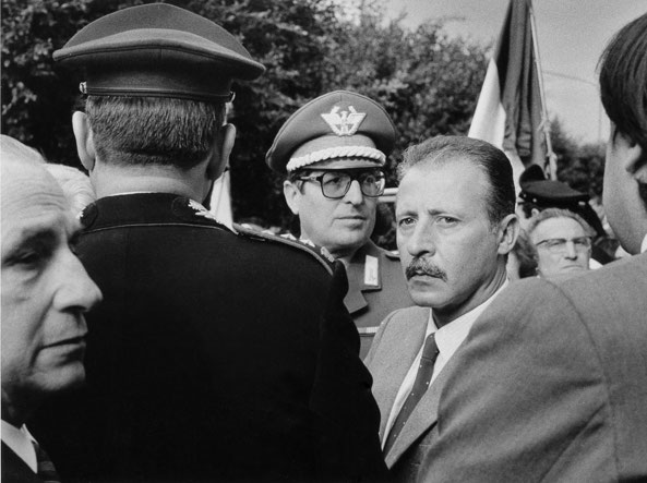 Letizia Battaglia: Letizia Battaglia, Judge Paolo Borsellino with Leoluca Orlando, Palermo, 1990, Letizia Battaglia Archive.
