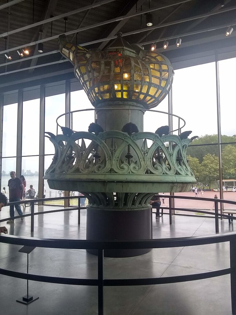 Statue of Liberty: The original torch on display at the Statue of Liberty Museum, New York City, NY, USA. Photograph by Epicgenius, 2019 via Wikimedia Commons (CC BY-SA 4.0).
