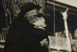 Alfred Stieglitz embracing his artistic partner and wife Georgia O'Keeffe